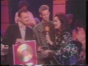 John holding his golden disc)